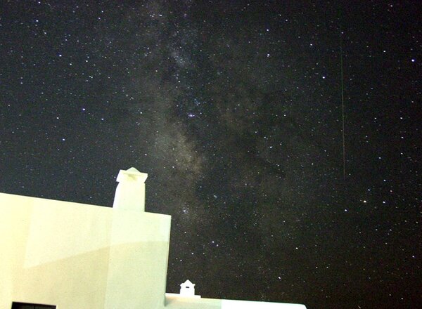 Milky way with bright meteor