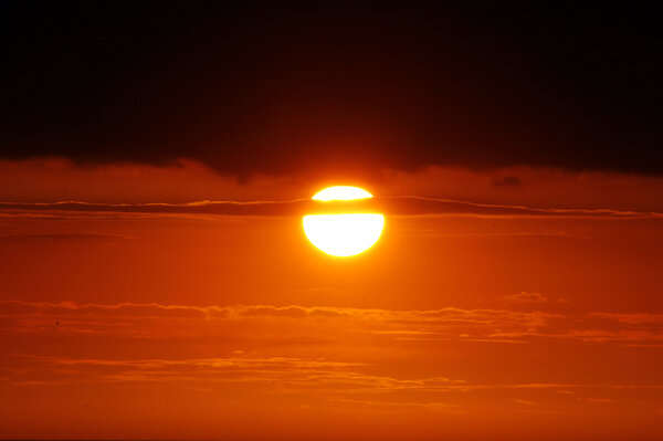 The Sun And Storm Clouds