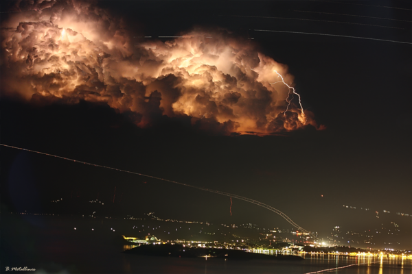 Startrails And Lightnings Over Corfu Town