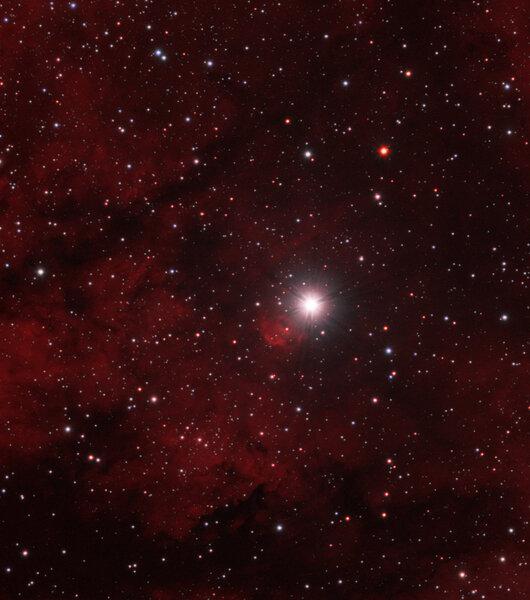 Around Gamma Cygni