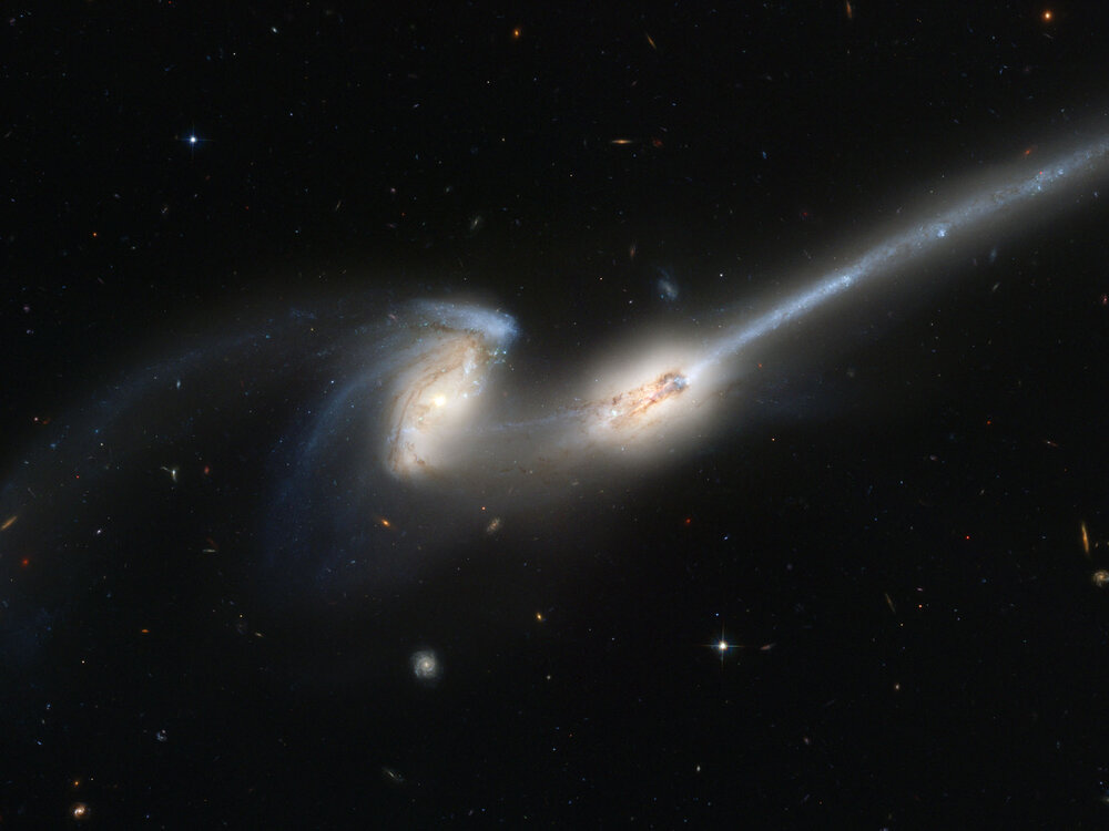 Merging_galaxies_NGC_4676_(captured_by_the_Hubble_Space_Telescope).thumb.jpg.4ff7abd0a0c999f123720bce39a0f918.jpg
