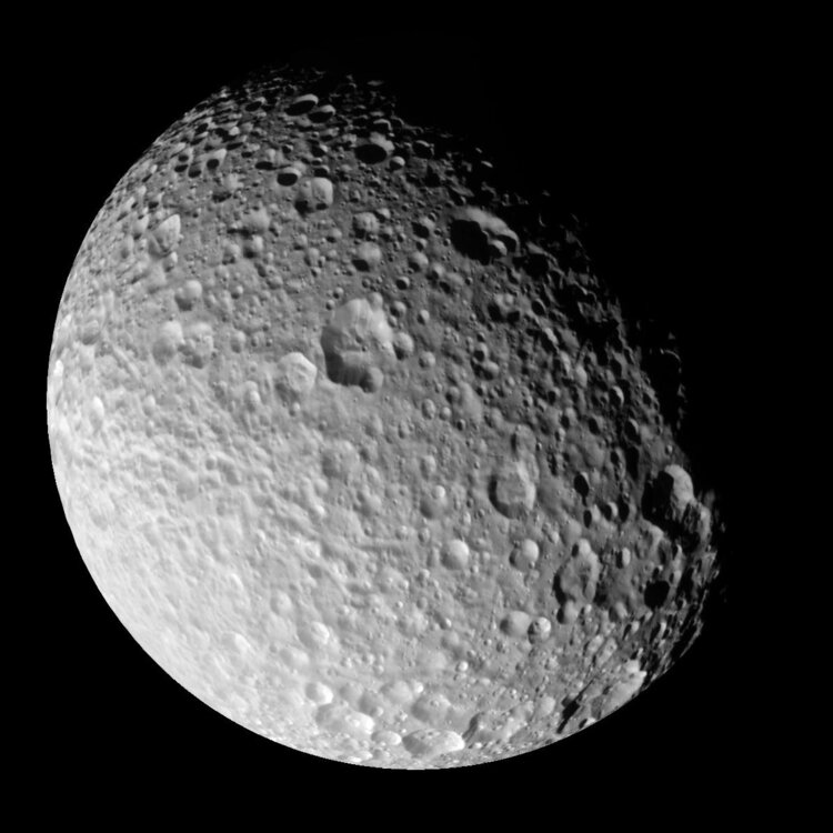 PIA06256_Mimas_full_view.thumb.jpg.d50318dbe9555fff487bd59c9a2d8288.jpg